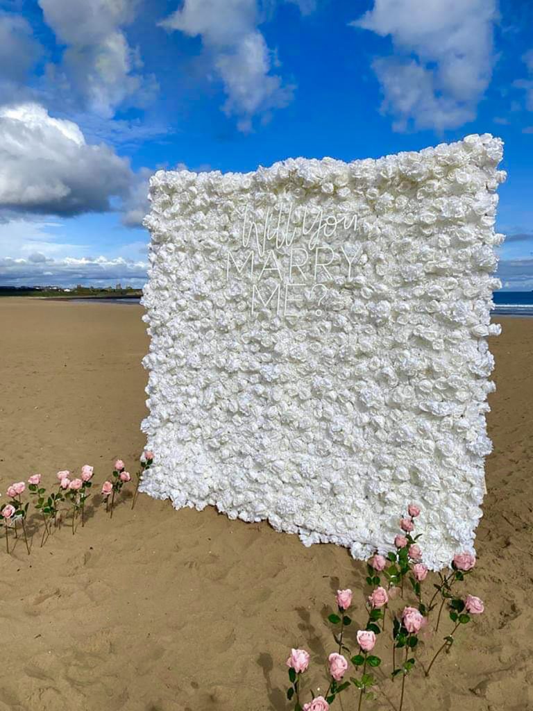 Bespoke proposals beach set up. Flower wall